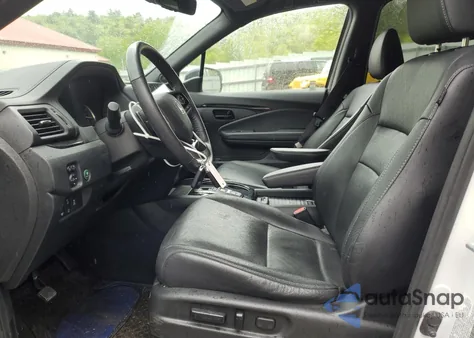 2023 Honda Passport Elite z USA, uszkodzony, nr VIN 5FNYF8H0XPB017677